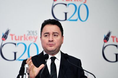 Turkey's Deputy Prime Minister Ali Babacan gestures during a press conference on the steps of the G20 finance ministers and central bank governors meeting in Istanbul on February 9, 2015. AFP PHOTO/ OZAN KOSE (Photo by OZAN KOSE / AFP)