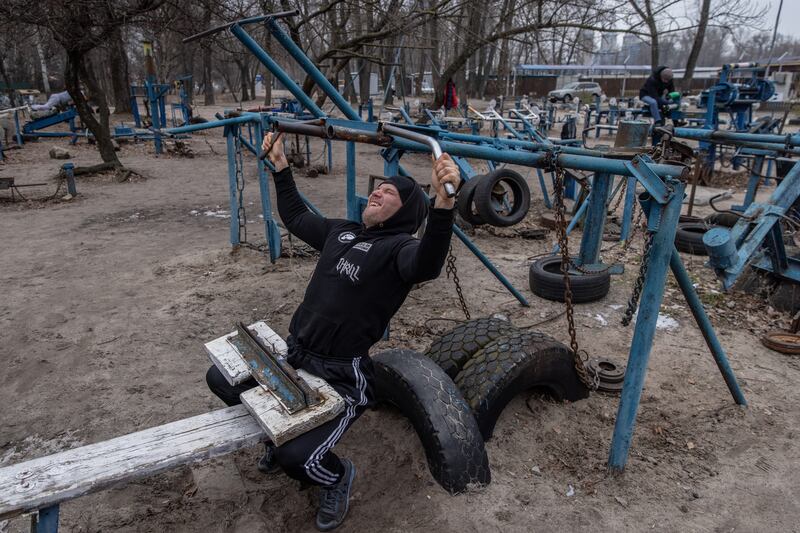 A man works out at Kiev's popular outdoor gym. Getty Images