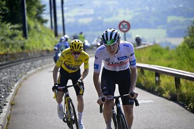 Tadej Pogacar, right, of UAE Team Emirates and overall leader Jonas Vingegaard of team Jumbo-Visma in action on the ascent of Puy de Dome during Stage 9 of the Tour de France on July 9, 2023. EPA 