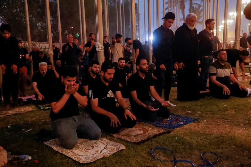 Protesters at prayer in the parliament building. Reuters