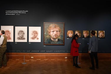 Portraits of British musician Ed Sheeran, painted by Irish artist Colin Davidson, are pictured on display during a press preview of the exhibition 'Ed Sheeran: Made in Suffolk' in Ipswich, east England on August 19, 2019. Ipswich, in eastern England has historically prided itself on farming and football, but is now celebrating the stellar pop career of its most famous son, Ed Sheeran. The global hit machine's journey to stardom began in the nearby town of Framlingham, where he played his first gig in front of around 30 people. - RESTRICTED TO EDITORIAL USE - MANDATORY MENTION OF THE ARTIST UPON PUBLICATION - TO ILLUSTRATE THE EVENT AS SPECIFIED IN THE CAPTION TO GO WITH AFP STORY by Pauline Froissart / AFP / Daniel LEAL-OLIVAS / RESTRICTED TO EDITORIAL USE - MANDATORY MENTION OF THE ARTIST UPON PUBLICATION - TO ILLUSTRATE THE EVENT AS SPECIFIED IN THE CAPTION TO GO WITH AFP STORY by Pauline Froissart