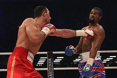 David Haye, right, takes a jab from Wladimir Klitschko during their heavyweight fight in Hamburg, Germany, in July 2011. Getty Images