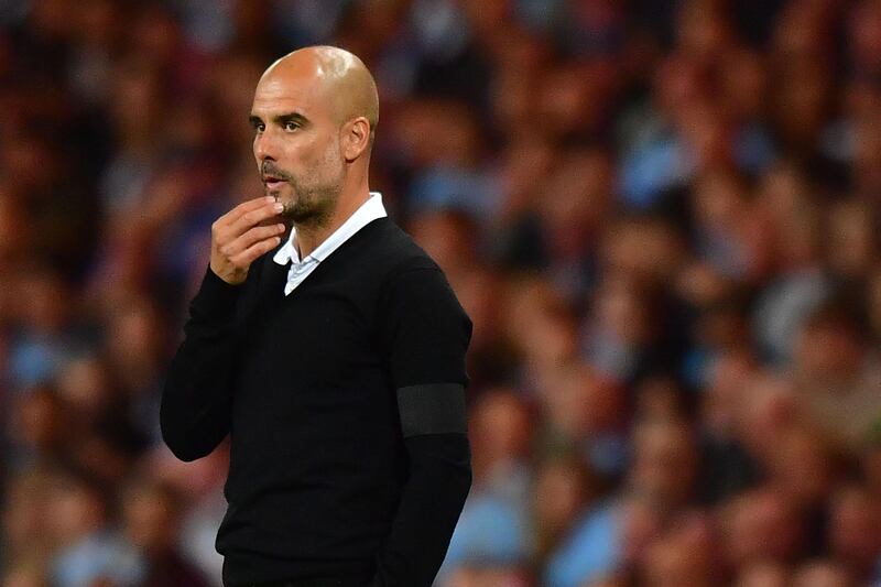 Manchester City's Spanish manager Pep Guardiola  gestures during the English Premier League football match between Manchester City and Everton at the Etihad Stadium in Manchester, north west England, on August 21, 2017. / AFP PHOTO / Anthony DEVLIN / RESTRICTED TO EDITORIAL USE. No use with unauthorized audio, video, data, fixture lists, club/league logos or 'live' services. Online in-match use limited to 75 images, no video emulation. No use in betting, games or single club/league/player publications.  /
