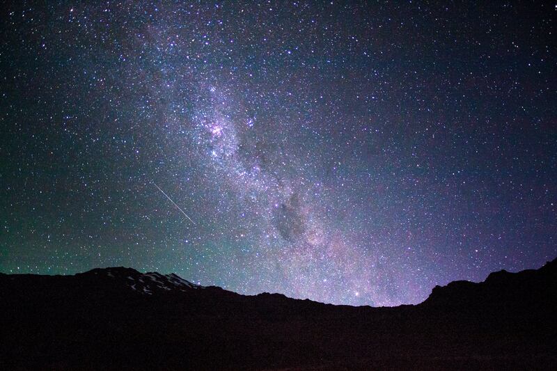 Milky Way rising over mt ruapehu with shooting star, Tongariro national park.