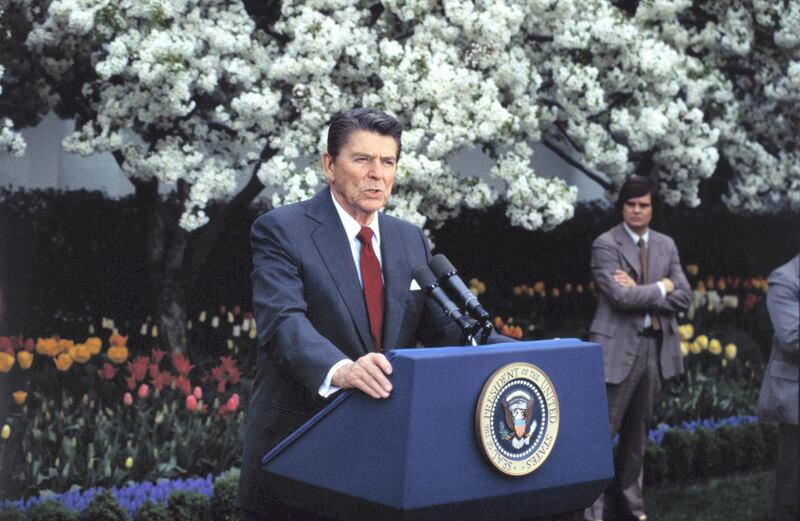 (Original Caption) Washington: President Reagan in a meeting with reporters in the Rose Garden of the White House, says he is "prepared to go the extra mile" in reaching an acceptable compromise with Congress on the 1983 budget.