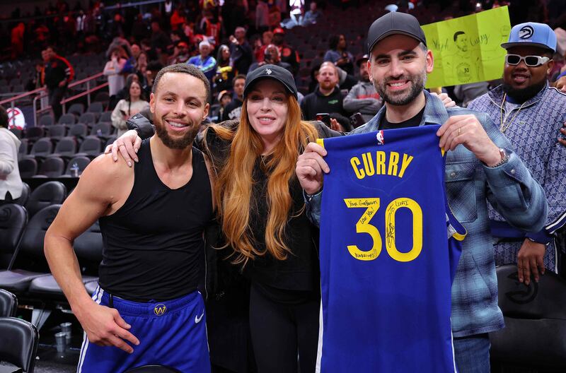 NBA star Stephen Curry and his wife, Ayesha, have been revealed as godparents to Lindsay Lohan and Bader Shammas's son. AFP