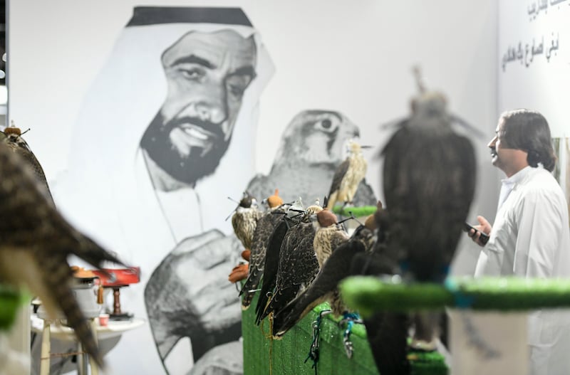 A poster of the UAE Founding Father, the late Sheikh Zayed bin Sultan Al Nahyan, at Al Sheraga Falconry stand. Khushnum Bhandari / The National 
 