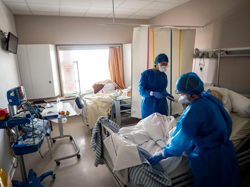 Nurses take care of a person infected with Covid-19 in the Joseph Imbert hospital in Arles, France. Getty Images