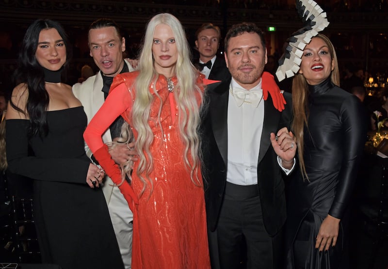 From left: Dua Lipa, Marcus Piggott, Kristen McMenamy, Mert Alas and Poonawalla attend a cocktail reception ahead of The Fashion Awards 2021 at London's Royal Albert Hall on November 29, 2021. Getty Images