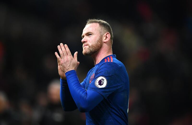 Wayne Rooney of Manchester United shows appreciation to Manchester United fans after the Premier League match between Stoke City and Manchester United at Bet365 Stadium on January 21, 2017 in Stoke on Trent, England. Wayne Rooney scored his 250th goal for Manchester United in all competitions, which makes him the club's top goal scorer of all time. Laurence Griffiths / Getty Images