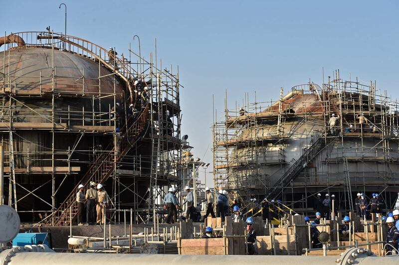 Employees work in Abqaiq oil processing plant. AFP