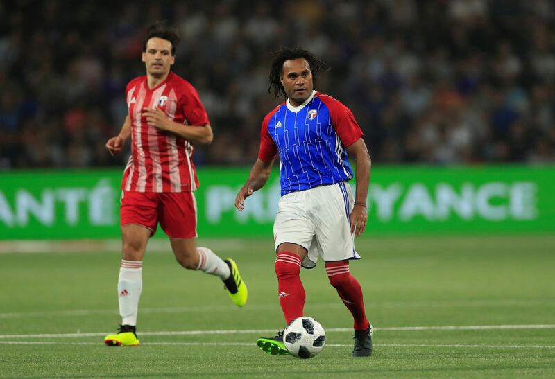Christian Karembeu of the France 98 team in action with FIFA 98’s Fernando Morientes. Gonzalo Fuentes / Reuters
