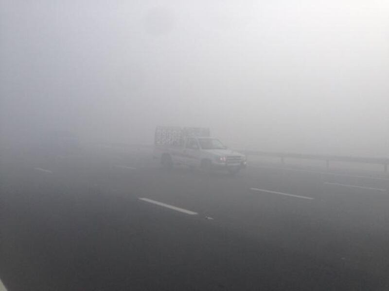 Dozens of accidents were reported on both sides of the motorway between Abu Dhabi and Dubai on Friday morning after heavy fog reduced visibility. Jen Thomas / The National