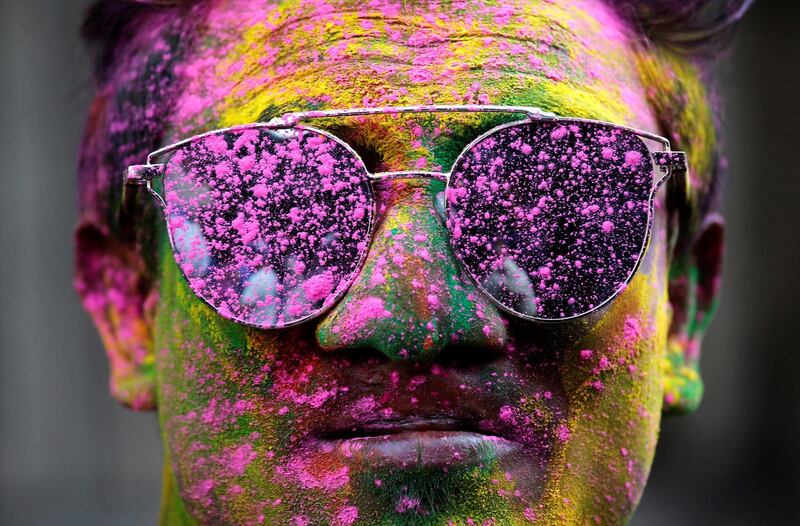 A man smeared in colours in Kolkata. Rupak De Chowdhuri / Reuters