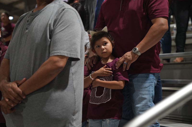 A young mourner at the vigil in Uvalde, Texas.  AFP