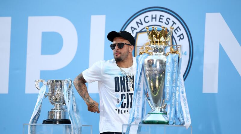 Kyle Walker of Manchester City during the Manchester City trophy parade. Lynne Cameron / Getty Images