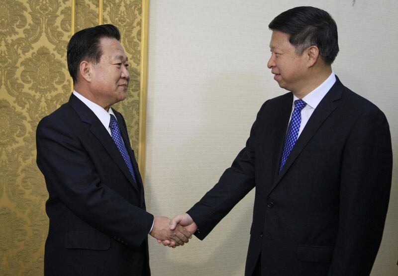 Choe Ryong Hae, left, vice chairman of the Central Committee of North Korea's ruling party shakes hands with Song Tao, the head of China's ruling Communist Party's International Liaison Department,  at the Mansudae Assembly Hall, in Pyongyang, Friday, Nov. 17, 2017. The highest-level Chinese envoy to North Korea in two years arrived in the countryâ€™s capital on Friday to try to improve relations that have soured over Beijingâ€™s tightening of sanctions and expressions of support for U.S. President Donald Trumpâ€™s calls for more pressure on the North to abandon its nuclear weapons program. (AP Photo/Kim Kwang Hyon)