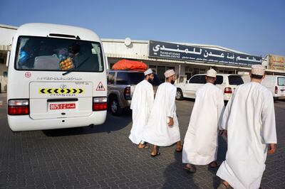 ABU DHABI, UNITED ARAB EMIRATES - - -  October 21, 2012 -- -   In the Western Region of Ghweifat, slices of pavement weaved in with lumps of dirt coat the parking area around a sliver of businesses at the Saudi border where a few taking the Hajj journey by car stop for a break. ( DELORES JOHNSON / The National )