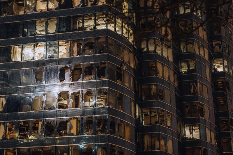 A building stands with shattered windows during a No. 10 Hurricane Signal raised for Typhoon Mangkhut in Hong Kong, China, on Sunday, Sept. 16, 2018. Typhoon Mangkhut continued wreaking havoc, belting Hong Kong with mammoth gales and rain, as it moved along the coast of China's Guangdong province following its deadly visit through the Philippines. Photographer: Anthony Kwan/Bloomberg