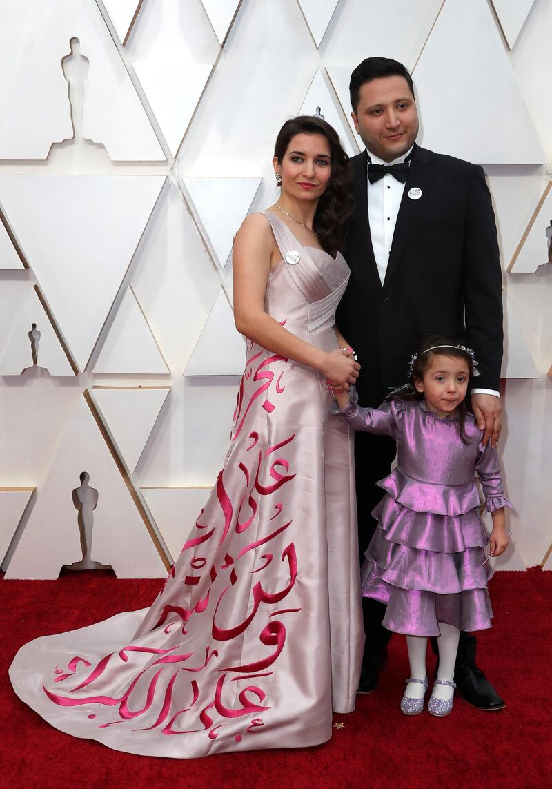 Waad Al-Kateab, in Reem Masri, poses on the red carpet during the 92nd Academy Awards in Hollywood on February 9, 2020. Reuters