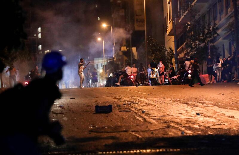 Lebanese anti-government protesters clash with security forces during a demonstration against dire economic conditions in the capital Beirut. AFP