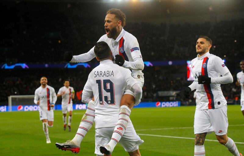 PSG's Pablo Sarabia, left, celebrates after scoring his side's second goal with his teammates Neymar, and Mauro Icardi. AP