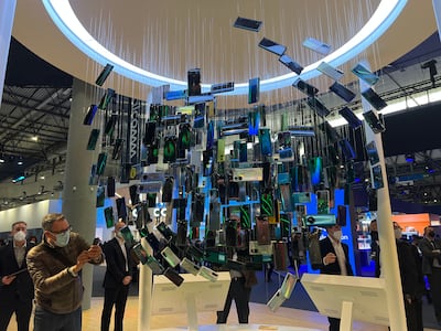 A smartphone showcase at the Vodafone stand at the Mobile World Congress in Barcelona. The UK-based telecom operator is highlighting its eco solutions at the event.