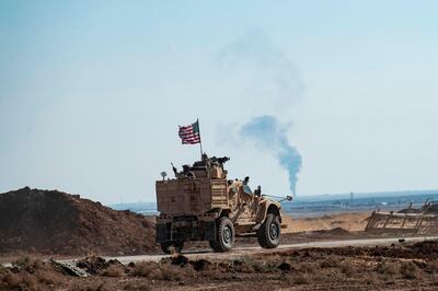 A US armoured vehicle patrols the village of Ein Diwar in Syria's northeastern Hasakeh province on November 4, 2019.  / AFP / Delil SOULEIMAN
