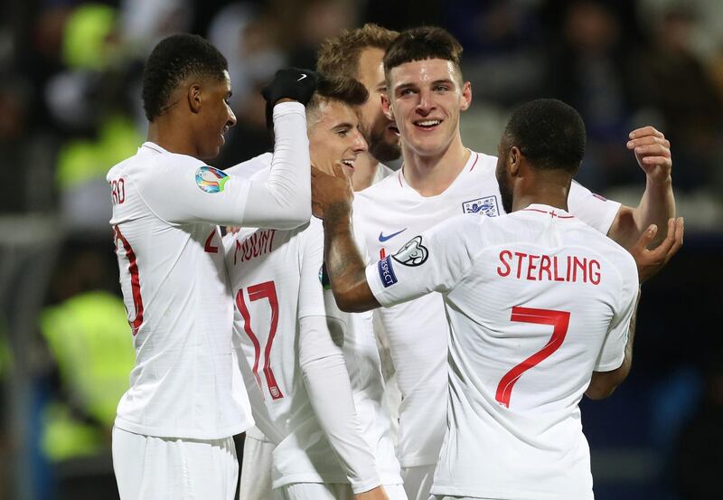England's Mason Mount celebrates scoring their fourth goal with teammates. Reuters