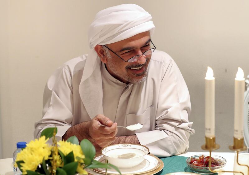 Ras al Khaimah, United Arab Emirates - May 26, 2019: Dr Khaled Al Mansoori. Emirati Iftar at Hajar Al Mansouri house as part of the Emirati values iftar project led by the Federal Youth Foundation aims to educate people on traditional UAE values. the project will see Emiratis urged to host expatriates for iftar during Ramadan. Sunday the 26th of May 2019. Ras al Khaimah. Chris Whiteoak / The National