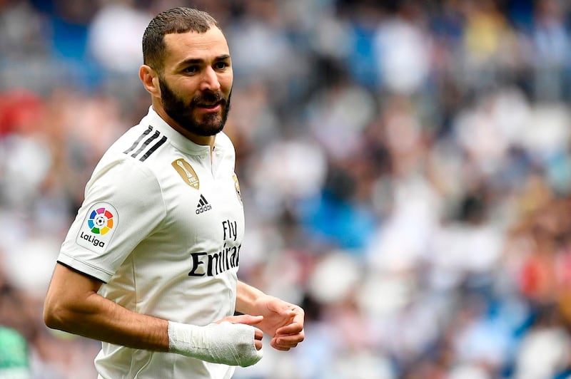 Real Madrid's French forward Karim Benzema runs during the Spanish League football match between Real Madrid and Real Betis at the Santiago Bernabeu stadium in Madrid on May 19, 2019. / AFP / PIERRE-PHILIPPE MARCOU
