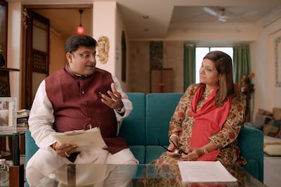 Sima Taparia, right, and astrologer Pundit Sushil-Ji, left, in 'Indian Matchmaking'. Netflix