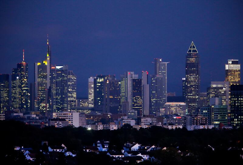 The buildings of the banking district are seen as night falls in Frankfurt, Germany, Thursday, Oct. 5, 2017.(AP Photo/Michael Probst)