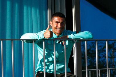 epa08741441 A handout photo made available by Portuguese Football Federation (FPF) shows Portugal national soccer team player Cristiano Ronaldo in the balcony of his room during his team training session for the upcoming UEFA Nations League soccer match with Sweden, Lisbon, Portugal, 13 October 2020. On 13 October 2020 the Portuguese Football Federation announced that Cristiano Ronaldo tested positive for COVID-19 coronavirus. Ronaldo is isolated and asymptomatic. EPA/DIOGO PINTO / HANDOUT HANDOUT EDITORIAL USE ONLY/NO SALES
