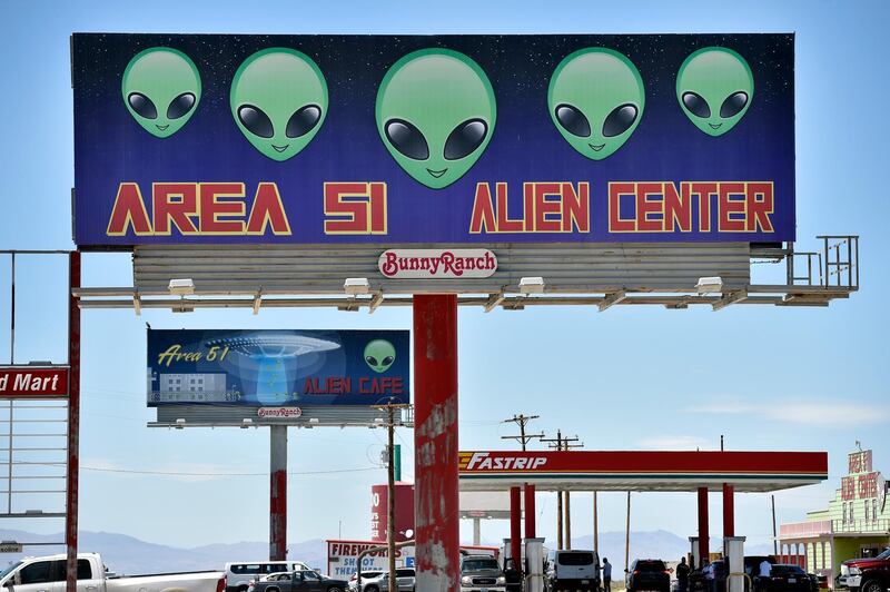 AMARGOSA VALLEY, NEVADA - JULY 21: A billboard advertising for a convenience store named the Area 51 Alien Center is seen along U.S. highway 95 on July 21, 2019 in Amargosa Valley, Nevada. A Facebook event entitled, "Storm Area 51, They Can't Stop All of Us," which the author meant as a joke, suggested the attendees to meet up at this colorful tourist attraction before storming the highly classified U.S. Air Force facility on September 20, 2019, to address a conspiracy theory that the U.S. government is conducting tests with space aliens.   David Becker/Getty Images/AFP