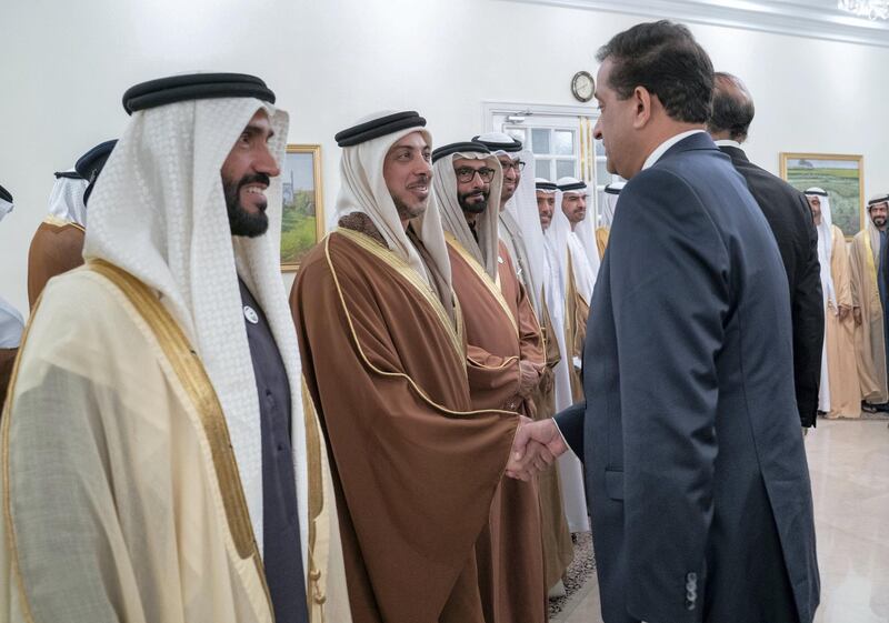 ISLAMABAD, PAKISTAN - January 06, 2019: HH Sheikh Mansour bin Zayed Al Nahyan, UAE Deputy Prime Minister and Minister of Presidential Affairs (2nd L), greets a guest during a reception at the Prime Minister's residence. Seen with HH Sheikh Nahyan Bin Zayed Al Nahyan, Chairman of the Board of Trustees of Zayed bin Sultan Al Nahyan Charitable and Humanitarian Foundation (L).

(  Mohammed Al Hammadi / Ministry of Presidential Affairs )
---