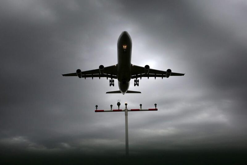 A Lufthansa aircraft lands at the Frankfurt airport on October 20, 2014. Fredrik von Erichsen / AP Photo