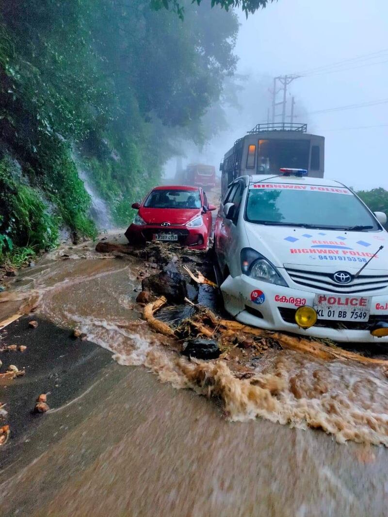 Drivers endure treacherous conditions as roads are deluged with floodwater. Photo: @AdvkShreeKanth via Twitter