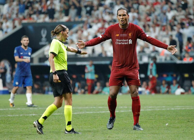 Referee Stephanie Frappart as Liverpool's Virgil van Dijk reacts after she awarded a penalty to Chelsea. Reuters