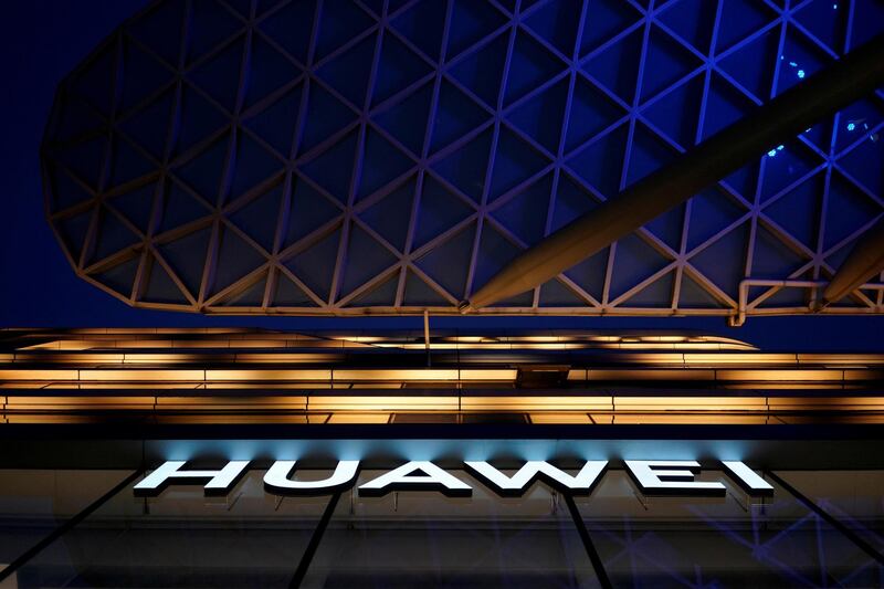 FILE PHOTO: A Huawei company logo is seen at a shopping mall in Shanghai, China June 3, 2019.  REUTERS/Aly Song/File Photo