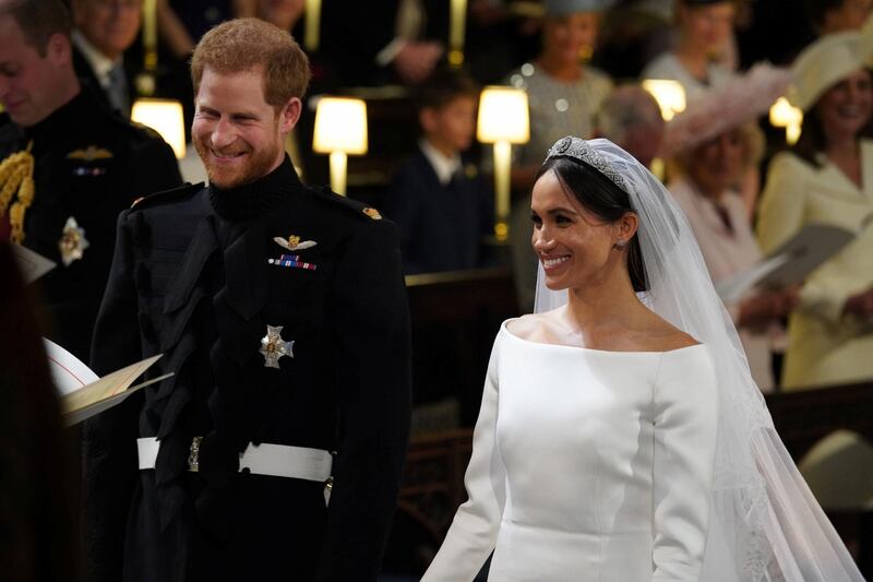 Prince Harry and Meghan Markle in St George's Chapel at Windsor Castle during their wedding in Windsor. Jonathan Brady / Reuters
