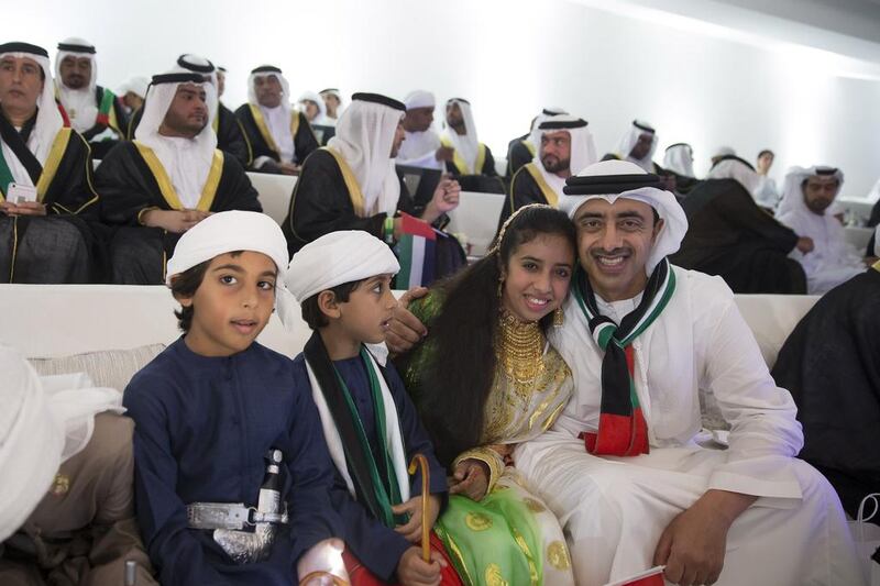 Sheikh Abdullah bin Zayed, Minister of Foreign Affairs (R) poses for a photo with Sheikha Fatima bint Abdullah (2nd R) at the 44th UAE National Day celebrations at Zayed Sports City. Mohamed Al Hammadi / Crown Prince Court - Abu Dhabi