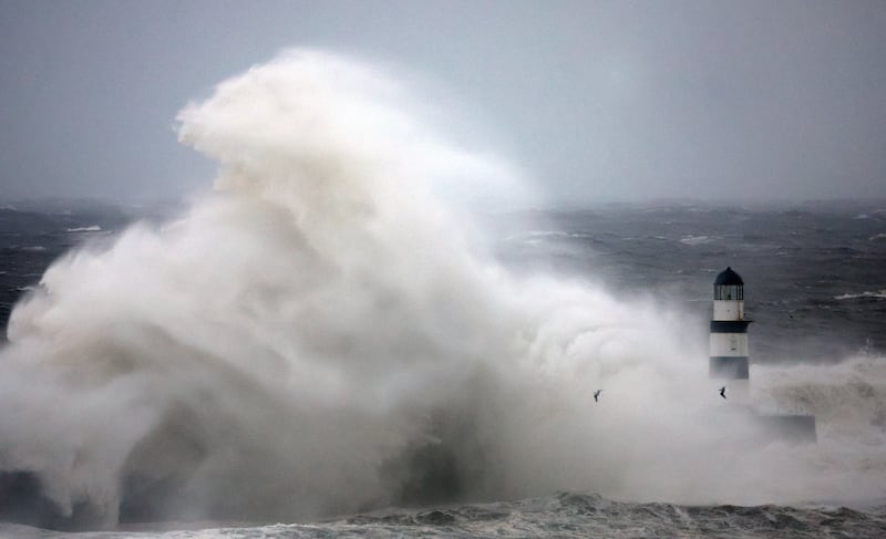 Waves crash against Seaham lighthouse, in County Durham, north-east England. Reuters