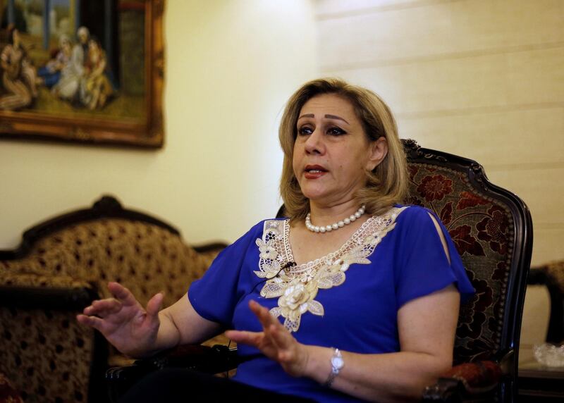 Leila Saleh, wife of Lebanese citizen Mohammed Saleh who was detained in Greece last week, speaks during an interview at their home in a suburb of the southern port city of Sidon, Lebanon. AP Photo