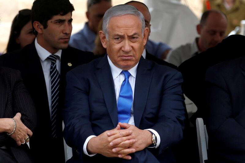 FILE PHOTO: Israeli Prime Minister Benjamin Netanyahu attends an annual state memorial ceremony for Israel's first prime minister, David Ben Gurion, at his gravesite in Sde Boker, Israel November 14, 2018. REUTERS/Ronen Zvulun/File Photo