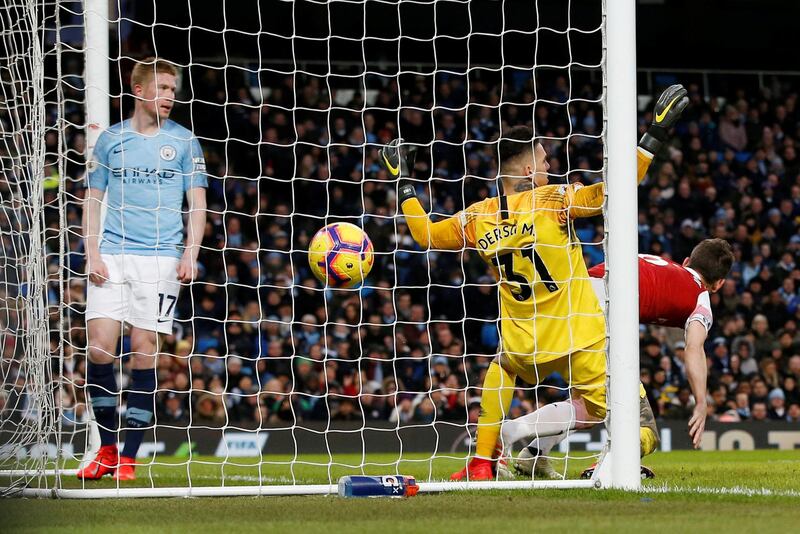 Arsenal's Laurent Koscielny scores their only goal. Reuters