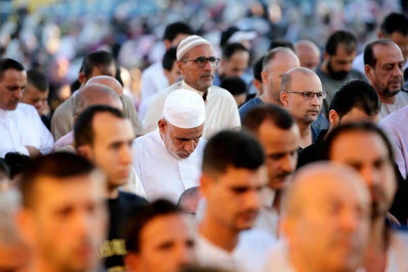 Muslims perform Eid Al Adha prayers in Amman, Jordan. EPA