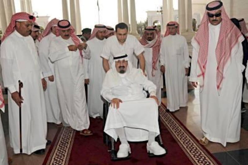In this photo released by Saudi Press Agency, King Abdullah, center, of Saudi Arabia arrives to his palace in Riyadh, Saudi Arabia, Friday, Nov. 19, 2010. The Saudi Press Agency (SPA) said that King Abdullah entered a hospital on Friday due to complications in the back pain suffered by them and the doctors advised him to rest. (AP Photo/Saudi Press Agency) ** EDITORIAL USE ONLY, NO SALES ** *** Local Caption ***  HAS102_Mideast_Saudi_Arabia_King.jpg