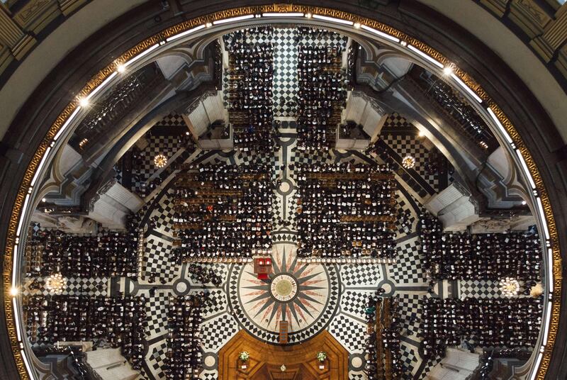 Guests take their seats ahead of the service during the ceremonial funeral of British former prime minister Margaret Thatcher in St Paul's Cathedral in central London on April 17, 2013. The funeral of Margaret Thatcher took place on April 17, with Queen Elizabeth II leading mourners from around the world in bidding farewell to one of Britain's most influential and divisive prime ministers.  AFP PHOTO / POOL / DOMINIC LIPINSKI
 *** Local Caption ***  928478-01-08.jpg