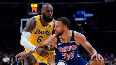 Los Angeles Lakers forward LeBron James, left, and Golden State Warriors guard Stephen Curry have been named in the USA Olympic team and will be part of the squad to play two exhibition matches in Abu Dhabi. AP